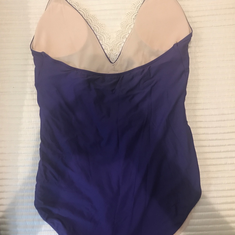 Medium plunge neck purple one piece bathing suit